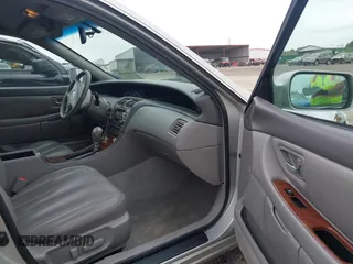 2002 Toyota Avalon XL with VIN 4T1BF28B82U240087, listed as a IAAI auction lot 41699355 with 263,253 mi miles. Bid and sale history available at carsss.com. Image 5.