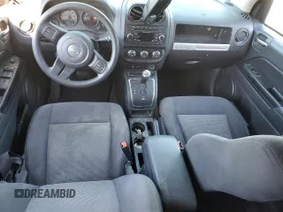 2016 Jeep Compass Sport with VIN 1C4NJCBB4GD765153, listed as a Copart auction lot 87743315 with 107,933 mi miles and Salvage title. Bid and sale history available at DreamBid. Image 8.