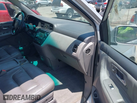 2004 Honda Odyssey EX-L with VIN 5FNRL18774B028164, listed as a IAAI auction lot 42454877 with 135,720 mi miles and . Bid and sale history available at DreamBid. Image 5.