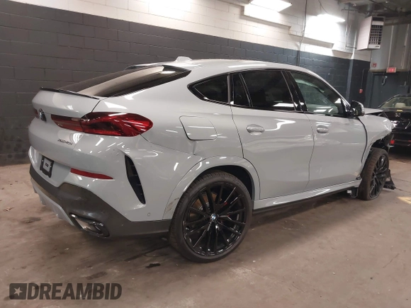 2025 BMW X6 xDrive40i with VIN 5UX33EX04S9Z44291, listed as a IAAI auction lot 41827897 with 1,053 mi miles. Bid and sale history available at carsss.com. Image 4.