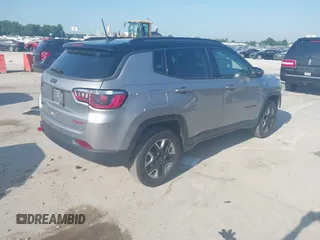 2017 Jeep Compass Trailhawk with VIN 3C4NJDDB3HT624492, listed as a IAAI auction lot 42618883 with 105,140 mi miles and . Bid and sale history available at DreamBid. Image 4.