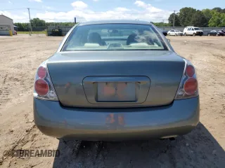 2006 Nissan Altima S z VIN 1N4AL11D46C244492, wystawiony jako Copart lot #56838745 z przebiegiem 133 579 mil mil oraz Szkoda całkowita • Salvage title. Historia ofert i sprzedaży dostępna na DreamBid. Obrazek 6.