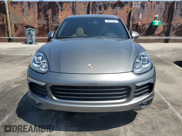 2016 Porsche Cayenne z VIN WP1AA2A22GKA08076, wystawiony jako Copart lot #55059565 z przebiegiem 71 521 mil mil oraz Szkoda całkowita • Salvage title. Historia ofert i sprzedaży dostępna na DreamBid. Obrazek 5.