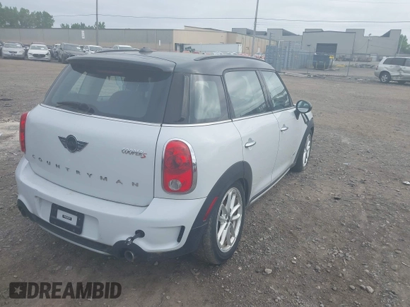 2015 MINI Countryman S with VIN WMWZC5C59FWM18935, listed as a IAAI auction lot 42427878 with 121,410 mi miles and . Bid and sale history available at DreamBid. Image 4.