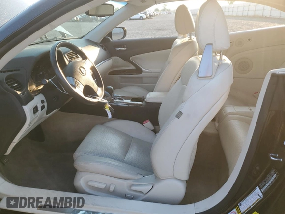 2014 Lexus IS 250 C z VIN JTHFF2C23E2529986, wystawiony jako Copart lot #75934524 z przebiegiem 66 574 mil mil oraz Szkoda całkowita • Salvage title. Historia ofert i sprzedaży dostępna na DreamBid. Obrazek 7.