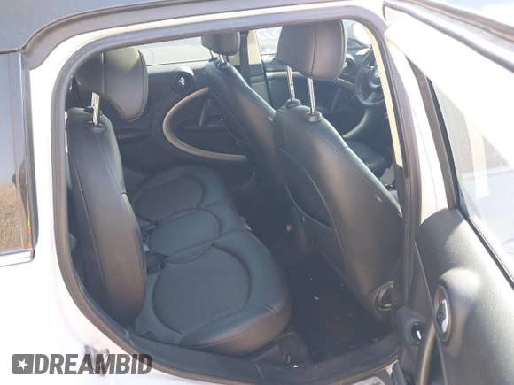 2012 MINI Countryman z VIN WMWZB3C51CWM03056, wystawiony jako IAAI lot #41743353 z przebiegiem 117 290 mil mil oraz . Historia ofert i sprzedaży dostępna na DreamBid. Obrazek 8.