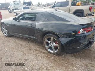 2014 Chevrolet Camaro LT z VIN 2G1FC1E38E9219031, wystawiony jako IAAI lot #41922230 z przebiegiem 135 539 mil mil oraz . Historia ofert i sprzedaży dostępna na DreamBid. Obrazek 3.