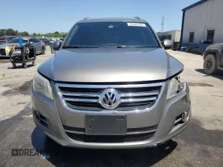 2011 Volkswagen Tiguan SE with VIN WVGBV7AX2BW561987, listed as a Copart auction lot 55385195 with 146,907 mi miles and Salvage Title. Bid and sale history available at DreamBid. Image 5.