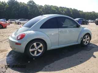 2010 Volkswagen Beetle with VIN 3VWRG3AG0AM027565, listed as a Copart auction lot 61908315 with 74,858 mi miles and Salvage title. Bid and sale history available at DreamBid. Image 3.