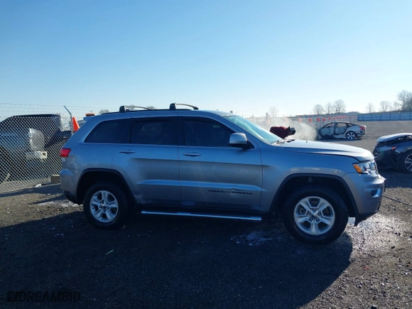 2017 Jeep Grand Cherokee Laredo with VIN 1C4RJEAG3HC890386, listed as a IAAI auction lot 41790836 with 67,166 mi miles. Bid and sale history available at carsss.com. Image 13.