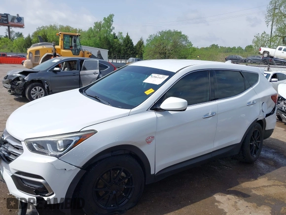 2017 Hyundai Santa Fe 2.4L z VIN 5XYZTDLB3HG439072, wystawiony jako IAAI lot #42061127 z przebiegiem 145 864 mil mil oraz . Historia ofert i sprzedaży dostępna na DreamBid. Obrazek 15.