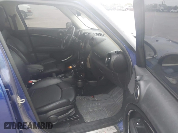 2015 MINI Cooper Countryman S with VIN WMWZC5C50FWP47426, listed as a IAAI auction lot 42108546 with 103,281 mi miles. Bid and sale history available at carsss.com. Image 5.
