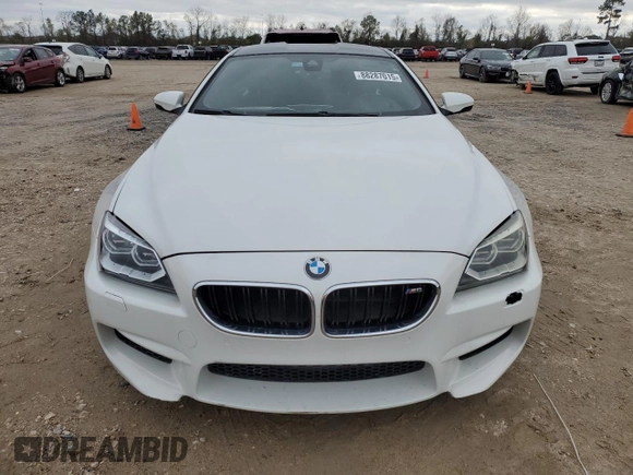 2014 BMW M6 z VIN WBSLX9C51ED160143, wystawiony jako Copart lot #88287015 z przebiegiem 91 717 mil mil oraz Szkoda całkowita • Salvage title. Historia ofert i sprzedaży dostępna na DreamBid. Obrazek 6.