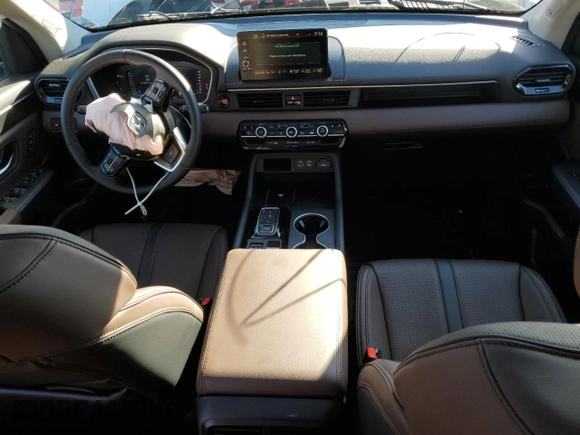 2025 Honda Pilot Elite with VIN 5FNYG1H82SB058680, listed as a Copart auction lot 42996425 with 9,890 mi miles and Salvage Title. Bid and sale history available at DreamBid. Image 8.