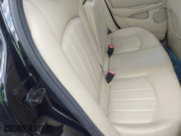 2004 Jaguar X-Type with VIN SAJEA51C44WD56659, listed as a IAAI auction lot 41712395 with Not Provided miles and . Bid and sale history available at DreamBid. Image 8.