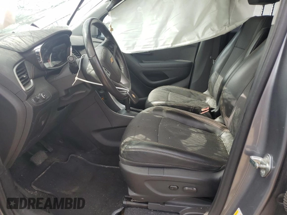 2020 Chevrolet Trax LT z VIN 3GNCJLSB4LL251497, wystawiony jako Copart lot #53252815 z przebiegiem 59 781 mil mil oraz Nie do naprawy. Historia ofert i sprzedaży dostępna na DreamBid. Obrazek 7.