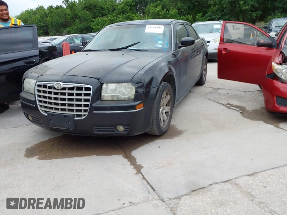 2006 Chrysler 300 Touring with VIN 2C3KA53G36H432859, listed as a IAAI auction lot 42141903 with 270,699 mi miles. Bid and sale history available at carsss.com. Image 2.