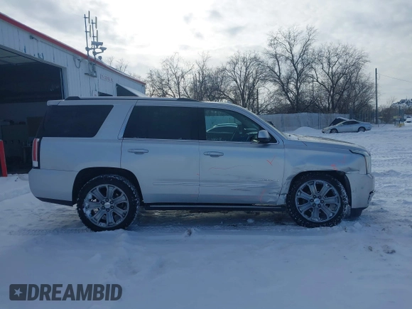 2016 GMC Yukon Denali with VIN 1GKS2CKJ7GR151020, listed as a IAAI auction lot 41539216 with 120,893 mi miles. Bid and sale history available at carsss.com. Image 13.
