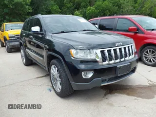 2013 Jeep Grand Cherokee Overland with VIN 1C4RJECT2DC588124, listed as a IAAI auction lot 42142573 with 204,309 mi miles and . Bid and sale history available at DreamBid. Image 1.