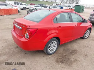 2012 Chevrolet Sonic LT with VIN 1G1JC5SH7C4133484, listed as a IAAI auction lot 42076809 with 100,506 mi miles and . Bid and sale history available at DreamBid. Image 4.