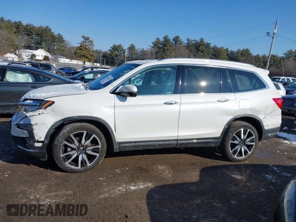 2020 Honda Pilot Elite with VIN 5FNYF6H09LB039247, listed as a IAAI auction lot 41364383 with 56,865 mi miles and . Bid and sale history available at DreamBid. Image 13.