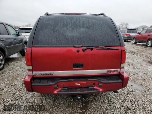 2000 GMC Jimmy SLE Convenience z VIN 1GKDT13W0Y2273829, wystawiony jako Copart lot #84811284 z przebiegiem 129 635 mil mil oraz Szkoda całkowita • Salvage title. Historia ofert i sprzedaży dostępna na DreamBid. Obrazek 6.
