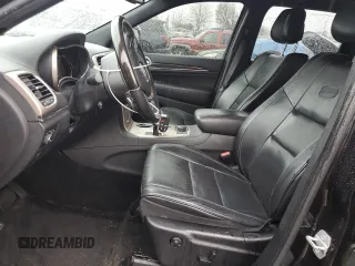 2015 Jeep Grand Cherokee Overland with VIN 1C4RJFCG7FC925995, listed as a Copart auction lot 85421214 with 142,266 mi miles and Salvage Title. Bid and sale history available at carsss.com. Image 7.