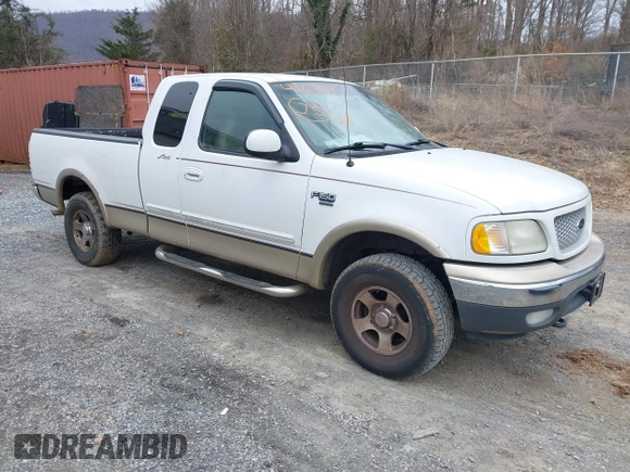 1999 Ford F-150 XL with VIN 1FTRX18LXXKA75357, listed as a IAAI auction lot 41630371 with 202,021 mi miles. Bid and sale history available at carsss.com. Image 1.