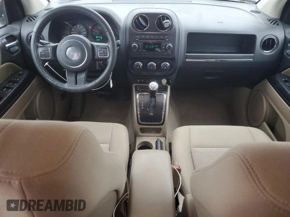 2012 Jeep Compass Latitude with VIN 1C4NJCEAXCD651896, listed as a Copart auction lot 86442794 with 92,181 mi miles and Salvage Title. Bid and sale history available at DreamBid. Image 8.