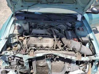 1999 Ford Escort LX with VIN 1FAFP10P6XW196483, listed as a Copart auction lot 59215635 with 74,859 mi miles and Salvage title. Bid and sale history available at DreamBid. Image 11.