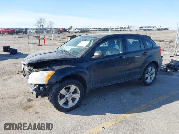 2010 Dodge Caliber SXT with VIN 1B3CB4HA4AD651946, listed as a IAAI auction lot 41771139 with 165,663 mi miles and . Bid and sale history available at DreamBid. Image 2.