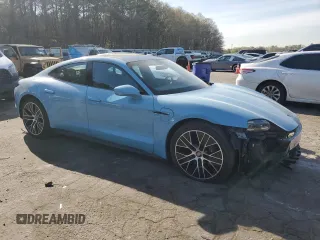 2023 Porsche Taycan with VIN WP0AA2Y11PSA11164, listed as a Copart auction lot 50695385 with 23,833 mi miles and Salvage Title. Bid and sale history available at DreamBid. Image 4.