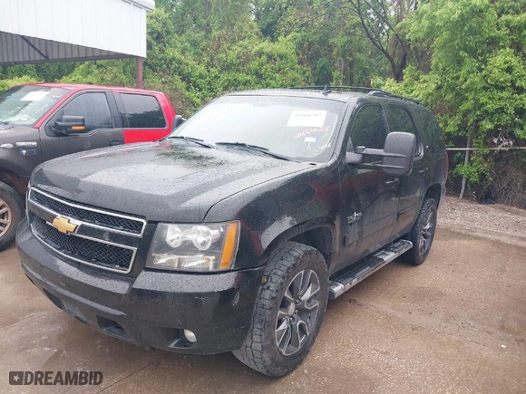 2013 Chevrolet Tahoe LT with VIN 1GNSKBE01DR374262, listed as a IAAI auction lot 41960707 with 243,045 mi miles. Bid and sale history available at carsss.com. Image 2.