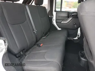 2018 Jeep Wrangler Unlimited Sport with VIN 1C4BJWDG8JL883524, listed as a Copart auction lot 52830295 with 63,659 mi miles and Salvage Title. Bid and sale history available at DreamBid. Image 11.