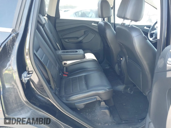 2013 Ford Escape SEL with VIN 1FMCU9H97DUA51529, listed as a IAAI auction lot 42164245 with 106,649 mi miles and . Bid and sale history available at DreamBid. Image 8.