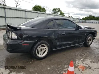 1997 Ford Mustang z VIN 1FALP4049VF169429, wystawiony jako Copart lot #59153175 z przebiegiem 134 454 mil mil oraz Szkoda całkowita • Salvage title. Historia ofert i sprzedaży dostępna na DreamBid. Obrazek 3.