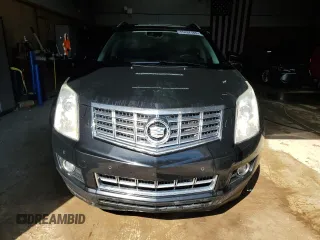 2014 Cadillac SRX Performance Collection z VIN 3GYFNFE31ES627978, wystawiony jako Copart lot #55437185 z przebiegiem 141 759 mil mil oraz Czysty tytuł • Clean title. Historia ofert i sprzedaży dostępna na DreamBid. Obrazek 5.