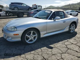 2003 Mazda MX-5 Miata Cloth z VIN JM1NB353430301685, wystawiony jako Copart lot #48756715 z przebiegiem 57 414 mil mil oraz Szkoda całkowita • Salvage title. Historia ofert i sprzedaży dostępna na DreamBid. Obrazek 1.