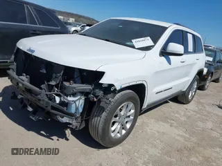 2021 Jeep Grand Cherokee Laredo E with VIN 1C4RJFAG5MC579865, listed as a IAAI auction lot 41818874 with 105,489 mi miles and . Bid and sale history available at DreamBid. Image 2.