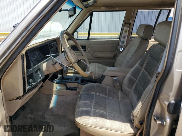 1993 Jeep Cherokee Sport с VIN 1J4FJ68S5PL642734, выставлен на аукционе Copart как лот 60755325 с пробегом 259 553 миль миль и Списание • Salvage title. История ставок и продаж доступна на DreamBid. Изображение 7.