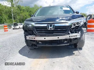 2017 Honda Ridgeline RTL with VIN 5FPYK3F51HB013989, listed as a IAAI auction lot 42206513 with 146,124 mi miles and . Bid and sale history available at DreamBid. Image 6.