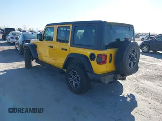 2021 Jeep Wrangler Unlimited Willys with VIN 1C4HJXDG4MW532399, listed as a IAAI auction lot 41833236 with 64,627 mi miles and . Bid and sale history available at DreamBid. Image 3.