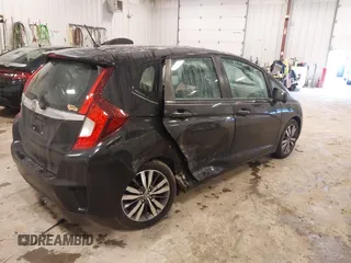 2015 Honda Fit EX-L with VIN 3HGGK5H84FM700823, listed as a IAAI auction lot 41488377 with 116,988 mi miles. Bid and sale history available at carsss.com. Image 4.