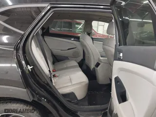 2018 Hyundai Tucson Value with VIN KM8J3CA28JU648236, listed as a IAAI auction lot 41161221 with 104,057 mi miles. Bid and sale history available at carsss.com. Image 8.