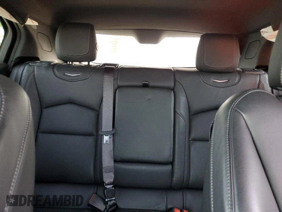 2019 Cadillac XT4 FWD Premium Luxury z VIN 1GYFZCR4XKF100124, wystawiony jako Copart lot #54249845 z przebiegiem 39 644 mil mil oraz Szkoda całkowita • Salvage title. Historia ofert i sprzedaży dostępna na DreamBid. Obrazek 10.