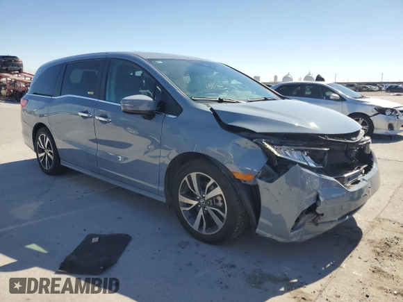 2024 Honda Odyssey Touring with VIN 5FNRL6H84RB001517, listed as a Copart auction lot 48306655 with 60,757 mi miles and Salvage Title. Bid and sale history available at carsss.com. Image 4.