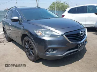 2015 Mazda CX-9 Grand Touring with VIN JM3TB3DA0F0459024, listed as a IAAI auction lot 42452288 with 174,716 mi miles and . Bid and sale history available at DreamBid. Image 1.