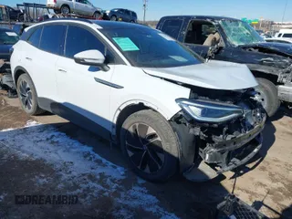 2021 Volkswagen ID.4 Pro S z VIN WVGTMPE28MP024897, wystawiony jako IAAI lot #41388913 z przebiegiem 45 973 mil mil oraz . Historia ofert i sprzedaży dostępna na DreamBid. Obrazek 1.