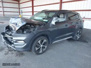 2018 Hyundai Tucson Value with VIN KM8J3CA20JU762120, listed as a IAAI auction lot 41878796 with 103,346 mi miles. Bid and sale history available at carsss.com. Image 2.