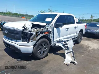 2024 Ford F-150 Lightning XLT с VIN 1FTVW3LK6RWG26665, выставлен на аукционе IAAI как лот 42337628 с пробегом 2 936 миль миль и . История ставок и продаж доступна на DreamBid. Изображение 2.